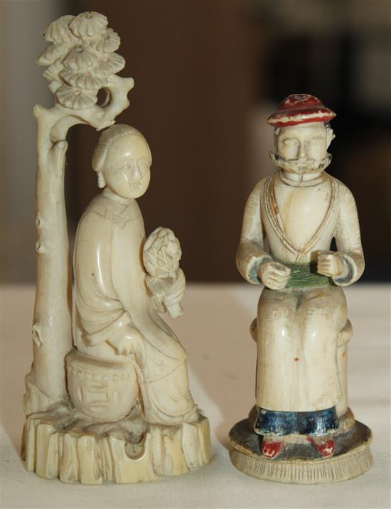 A Chinese ivory figure of a lady seated beneath a tree and an Indian ivory figure of a seated man, 19th century, 10.5 and 8.5cm